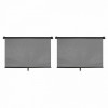 Set de 2 bucati de rulouri solare destinate utilizarii pe ferestrele automobilului. 2x45cm. Modul de perforare a materialului asigura absorbtia a aproximativ 70% din razele solare si in acelasi timp permite conducatorului vizibilitate maxima...